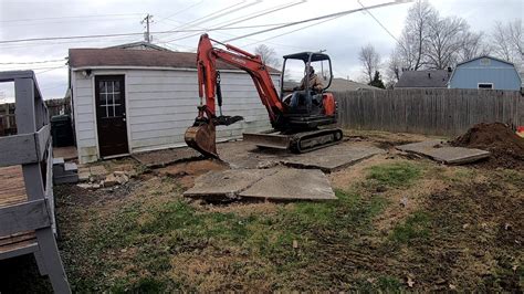 Kubota Mini Ex BREAKING a Concrete Patio & Grading a Backyard